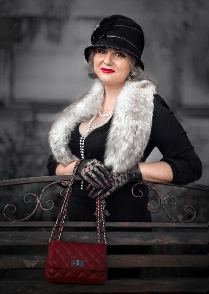 beautiful women wearing vintage 20s dress with cloche hat