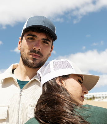 men & women wearing a trucker hat by fushia