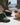 three baseball caps laying on table